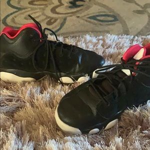 Black white and pink Jordan’s